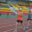 Владимир Попов (в красной майке), мастер спорта России, многократный призер чемпионатов России в беге на 1500 метров, чемпион России  в эстафетном беге, рад возможности тренироваться на стадионе.
